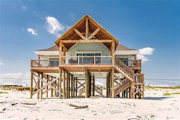 Why are beach houses built on stilts